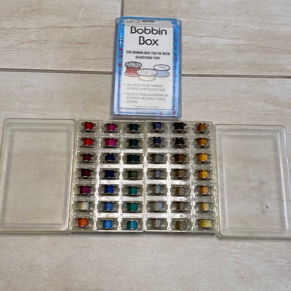 Bobbin Boxes with threaded bobbins included.